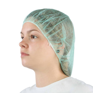 24 Inch Bouffant Cap/Hairnet woman wearing green hairnet, Bouffant Cap/Hairnet, COLOR, Green, Package, 10 Packs of 100, PPE-PERSONAL PROTECTIVE EQUIPMENT, HAIR NETS, COVID ESSENTIALS, 7732G